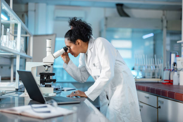 Researcher working with research compounds